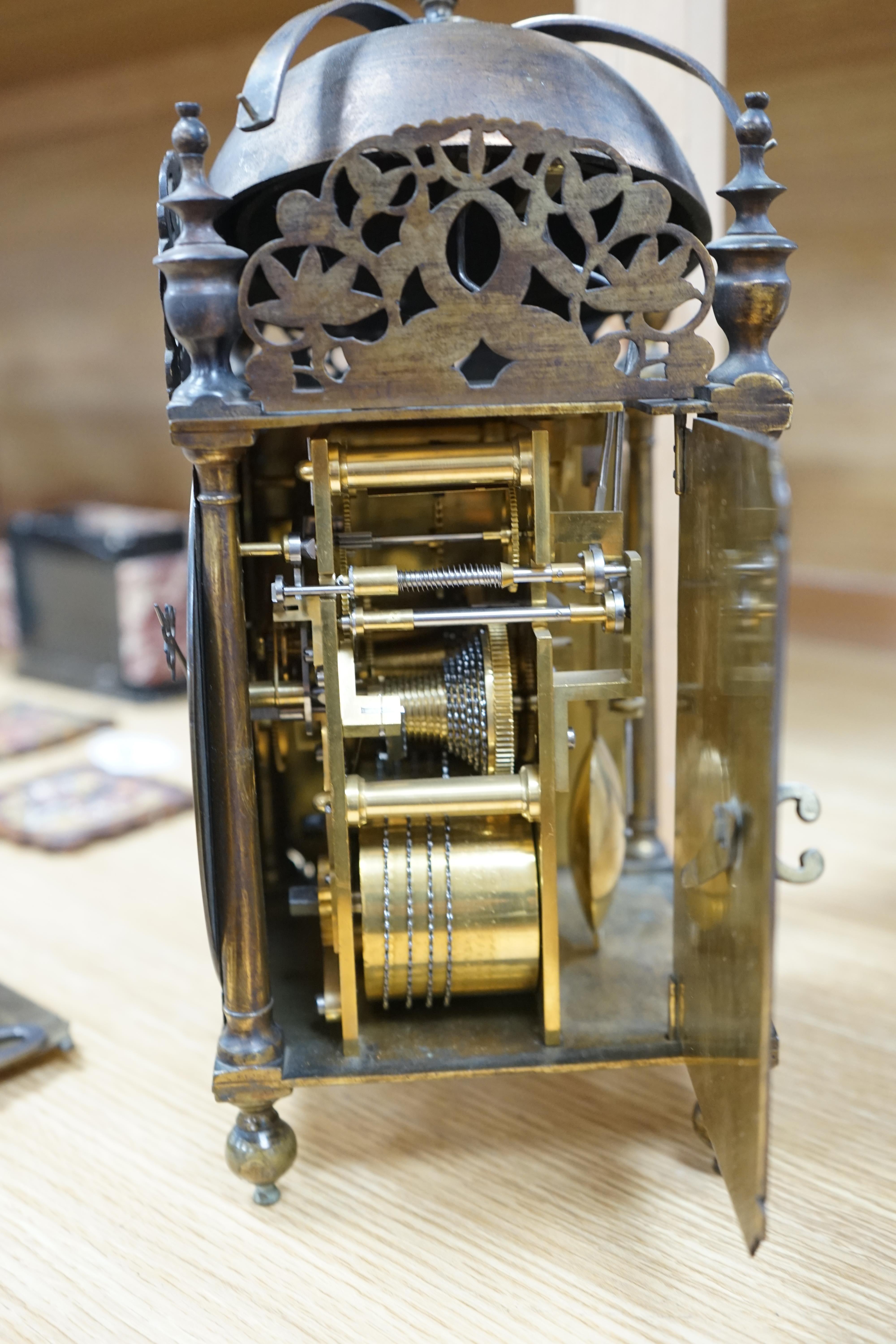 A Victorian lantern clock, Thomas Loomes at the Mermaid in Lothbury to the dial plate, twin fusee movement, 35cm high. Condition - fair, parts detached